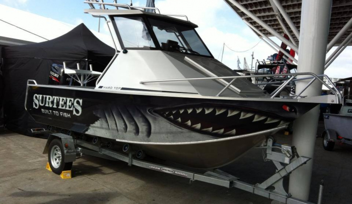 Onfire design surtees boat wrap design