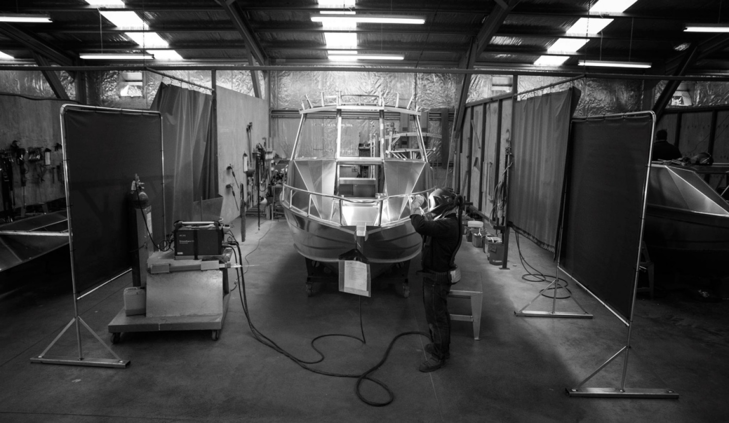 onfire design Surtees Boats Factory